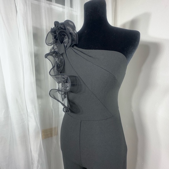 Chic Black One-Shoulder Jumpsuit with Ruffle Detail - Picture 3 of 7